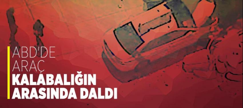 ABD'de araç kalabalığın arasında daldı