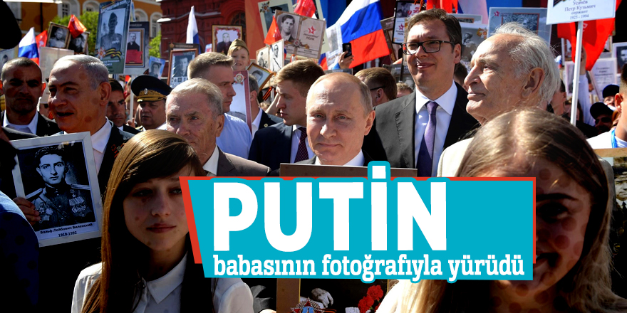 Putin, babasının fotoğrafıyla yürüdü