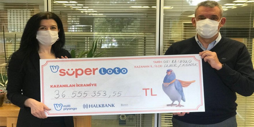 Süper Loto’dan büyük ikramiye kazanan talihli çekini teslim aldı